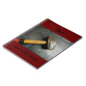 ハンマーを振り回す万物の手利屋のフィクサー ノートブック (左側)