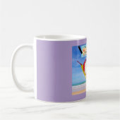 ハンモックとヤシの木を凍らせるサンタ コーヒーマグカップ (左)