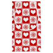 ハートおよび雪片のクリスマスパターン スモールペーパーバッグ (裏面)