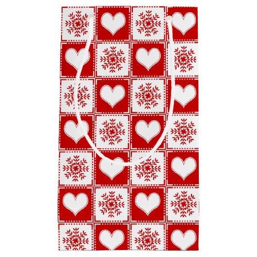 ハートおよび雪片のクリスマスパターン スモールペーパーバッグ (正面)