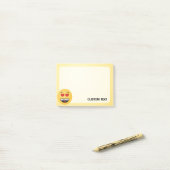 ハートのような目をした笑顔の顔 ポストイット (デスク上)