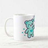 ハートの愛を抱くかわいい青いテディベア コーヒーマグカップ (左)