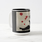 ハートの泡を吹いている男の子 ツートーンマグカップ (正面左)