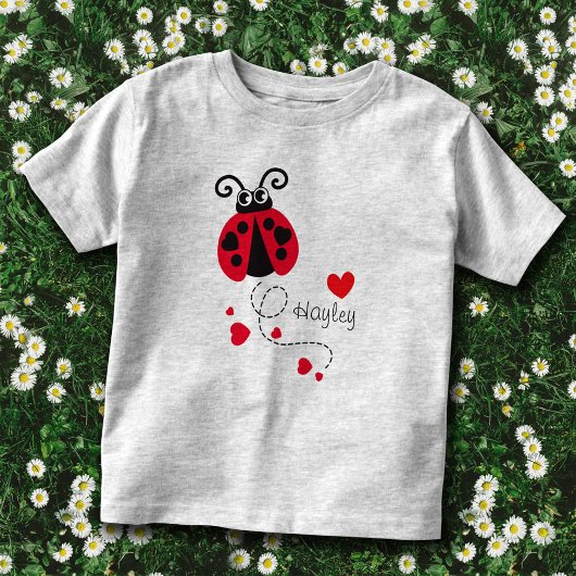 ハートの赤い名前Tシャツを飛ぶヒメムシ トドラーTシャツ