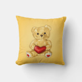 ハートの黄色を保持しているかわいいテディー・ベアのHypnotist クッション (正面)