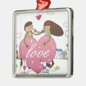 ハートを保持するカップルのクローズアップは形づきます メタルオーナメント (左)