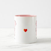 ハートを持ったかわいいピンクの象 ツートーンマグカップ (中央)