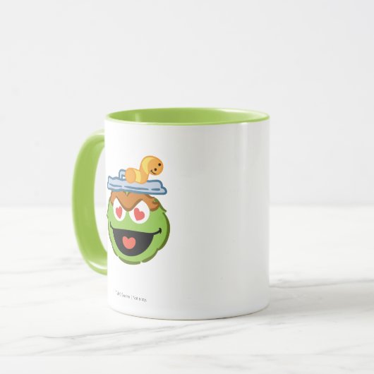 ハート形の目が付いているオスカーの微笑の顔 マグカップ (正面左)