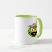 ハート形の目が付いているオスカーの微笑の顔 マグカップ (正面右)