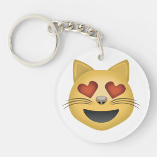 ハート形の目Emojiが付いている微笑猫の顔 キーホルダー