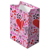 ハート、XOXOピンクパターンラッピング紙 ミディアムペーパーバッグ (正面アングル)