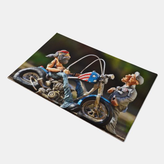 ハーレーのバイクもしくは自転車に乗る人の玄関マットの漫画 ドアマット (アングル)