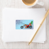 バイクに乗ったサンタとクリスマスツリーのラベル ラベル (インサイチュ)