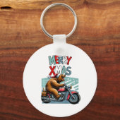バイクもしくは自転車に乗る人クマとクリスマスハットウィッシュメリークリスマスフー キーホルダー (正面)