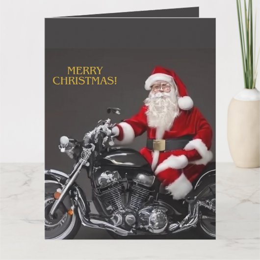 バイクもしくは自転車に乗る人サンタクロース折り畳みグリーティングカード カード (正面)