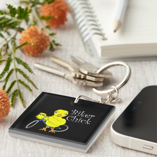 バイクもしくは自転車に乗る人シック文字 キーホルダー (正面右)