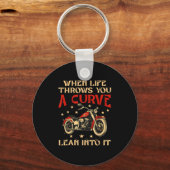 バイクもしくは自転車に乗る人時の人生は曲線オートバイの男性をスロー キーホルダー (正面)