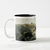 バイソンを捜しているインディアンは容積2からの31をめっきします ツートーンマグカップ (左)