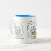 バスケットと春の花の復活祭のバニー ツートーンマグカップ (正面左)