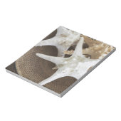 バスケットに入ったヒトデ ノートパッド (回転)