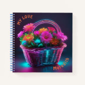 バスケットに入った明るい色の花のモノグラム | ノートブック (正面)