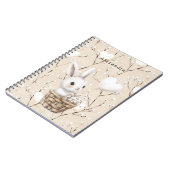 バスケットに入った白いバニーハート ノートブック (左側)