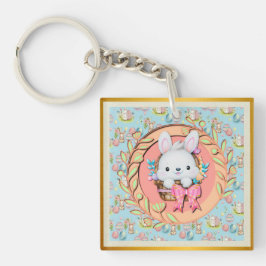 バスケットに座って可愛いイースターバニー キーホルダー