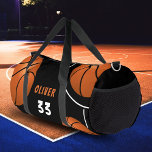 バスケットボールおもしろいスポーツプレーヤー名番号 ダッフルバッグ<br><div class="desc">バスケットボールおもしろいスポーツプレーヤー名番号ダッフルバッグ。そのデザインは黒い背景にバスケットボールのボールを持っている。名前とプレイヤー番号を追加する。</div>