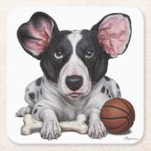 バスケットボールと骨の斑点のある犬