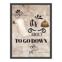 バスルームのポスターを下りようとしている