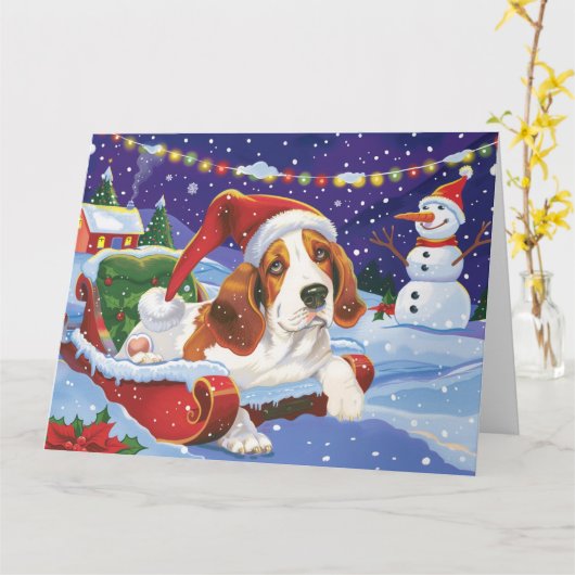 バセットハウンドの犬のそり雪クリスマス カード (黄色い花)