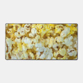 バター付きポップコーンの背景 デスクマット (正面)