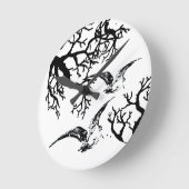 バッカチア・イン・ヴォロ・トラ・イ・ラミ・ラウンド・クロック ラウンド壁時計 (傾斜)