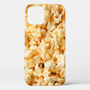 バックグラウンド全体においしいポップコーン。食べ物 iPhone 12ケース