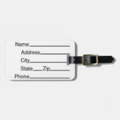 バックパックとラゲッジタグ（革ひも付き） ラゲッジタグ (正面横)