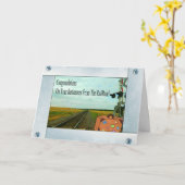 バッグが付いているまっすぐな鉄道線路そして交差 カード (黄色い花)