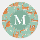 バッド・オレンジタビー猫がパターンを物ノック ラウンドシール (正面)