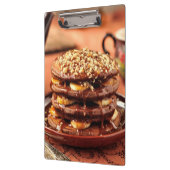 バナナおよびカラメルが付いているチョコレートパンケーキ クリップボード (左)