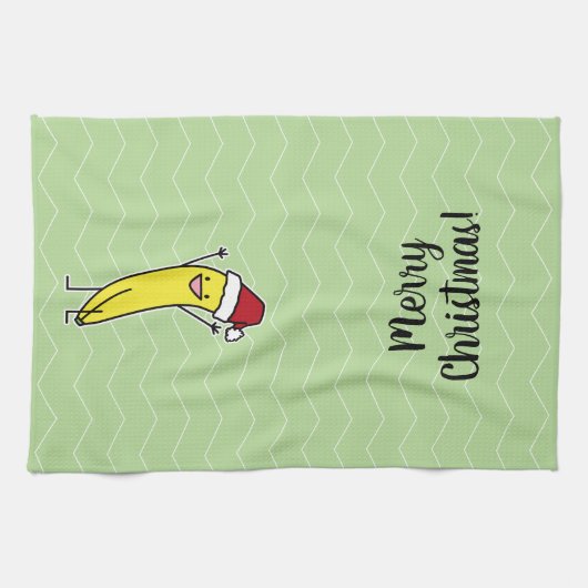 バナナのサンタの帽子の元気づけるクリスマスの休日 キッチンタオル (横)