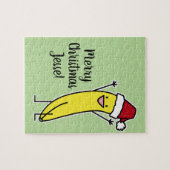 バナナのサンタの帽子の元気づけるクリスマスの休日 ジグソーパズル (横)