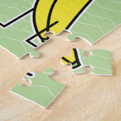 バナナのサンタの帽子の元気づけるクリスマスの休日 ジグソーパズル (側面)