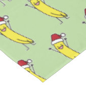 バナナのサンタの帽子の元気づけるクリスマスの休日 テーブルクロス (アングル)