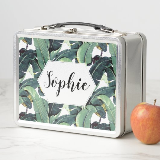 バナナはヤシの木にステンレス製のお弁当箱を去ります メタルランチボックス (インサイチュ)