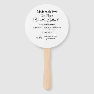 バニラエキス自家製の材料を加える重量デ ハンドファン