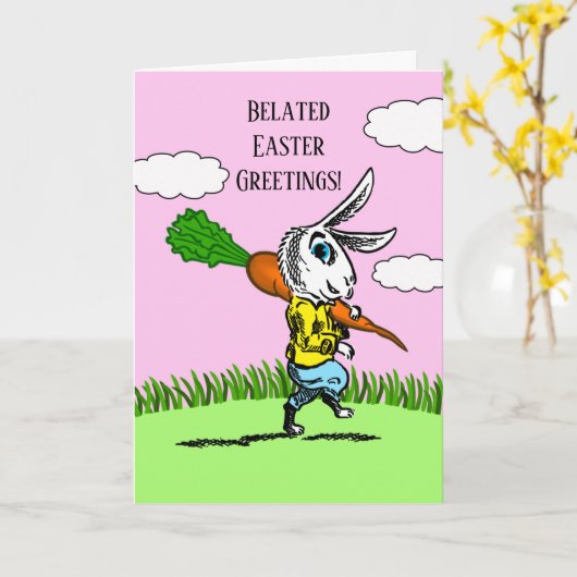 バニーと大きなニンジンとの遅れた復活祭の挨拶 カード (黄色い花)