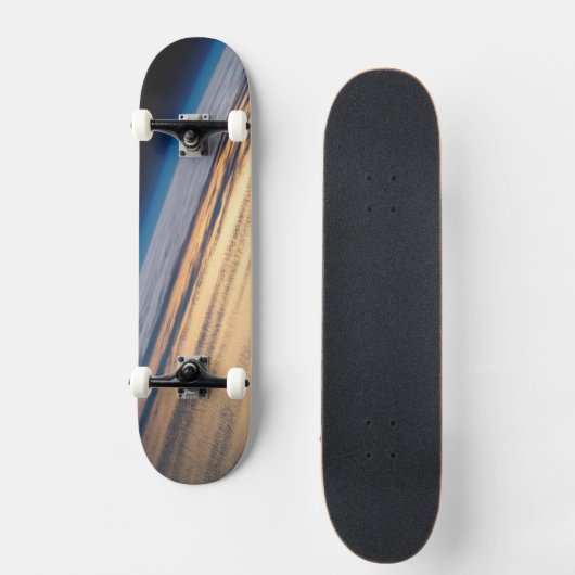 バハ・カリフォルニアの海岸沖の公転の夕日 スケートボード (正面)