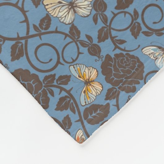 バラおよび蝶が付いているパターン フリースブランケット (角)