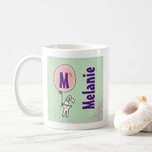 バルーンモノグラムを持ったかわいいバニー コーヒーマグカップ