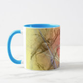 バレルレーサー（黄色のオレンジ色の渦巻き） マグカップ (左)