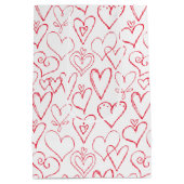 バレンタインの赤い落書きハートのパターン ミディアムペーパーバッグ (裏面)